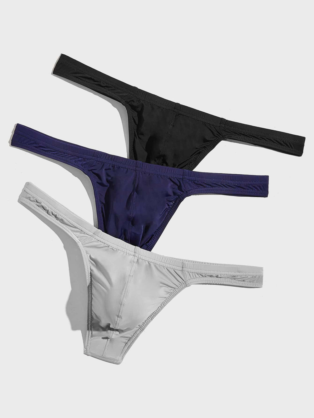 3-pack of men's low-rise solid color thongs made from high-stretch polyamide blend fabric