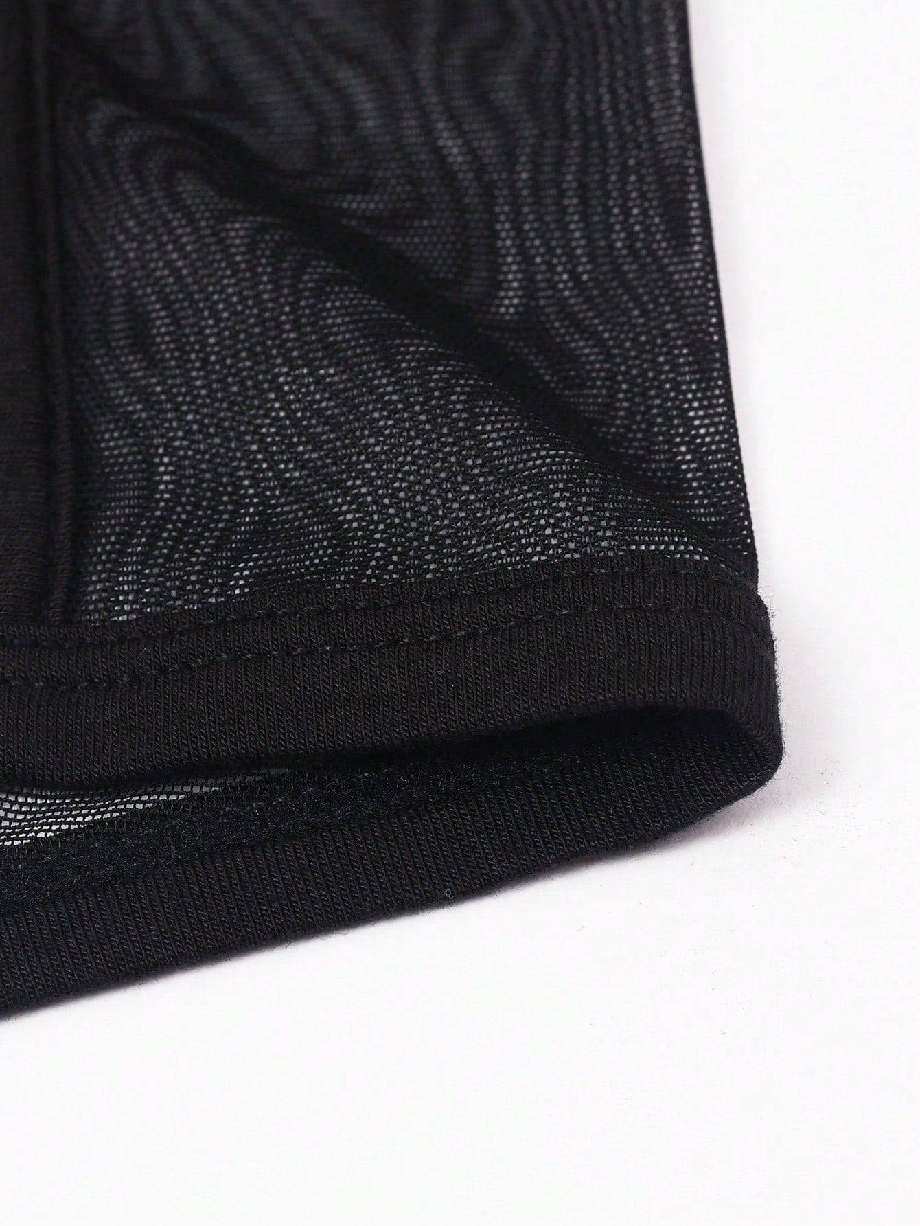 Men's black sheer mesh underwear with contrast mesh panels, mid rise waist, plain design, and medium stretch fabric for daily wear.
