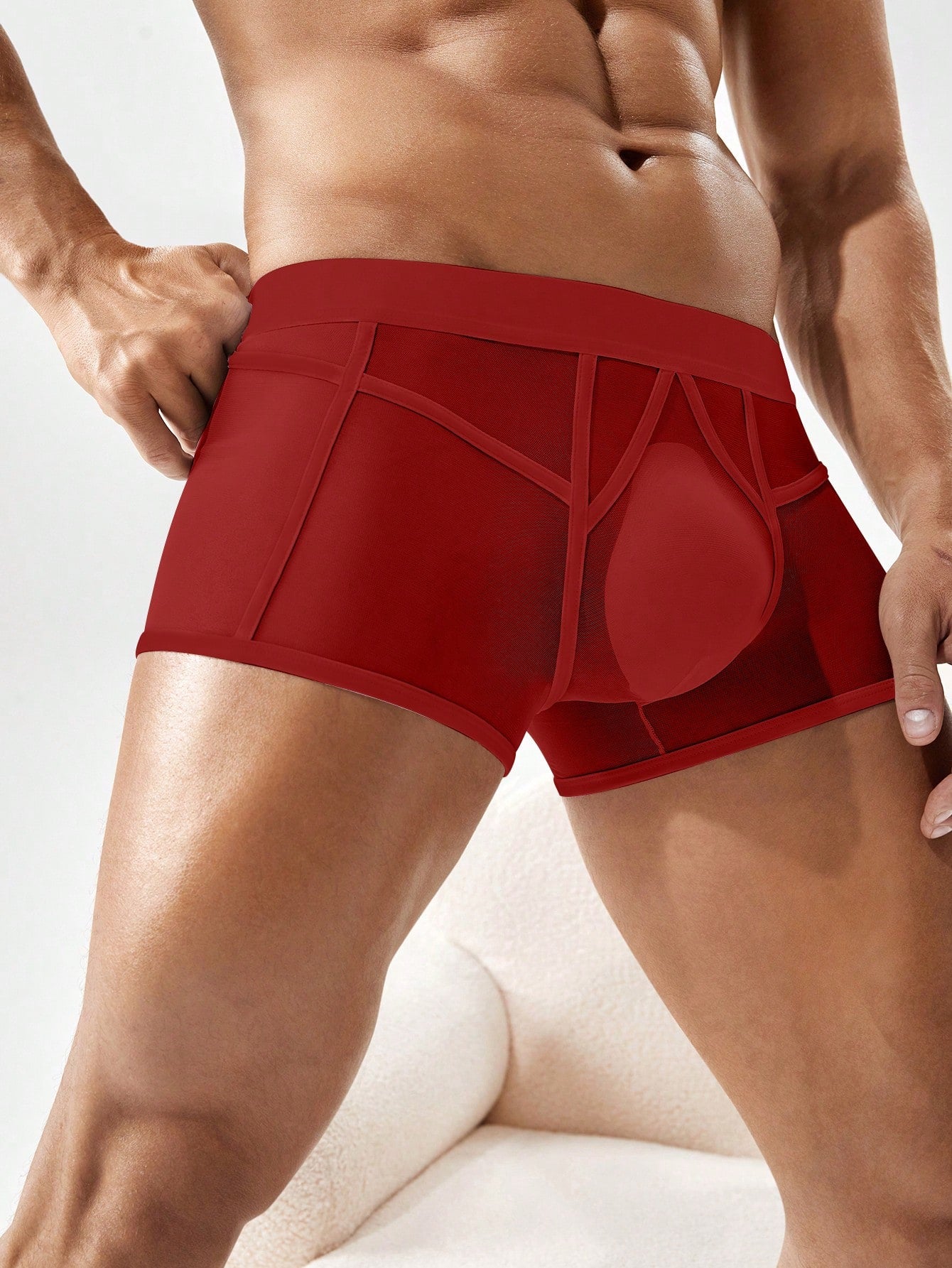 Men's mesh boxer shorts with colorblock design, contrast trim, and mid-rise fit.