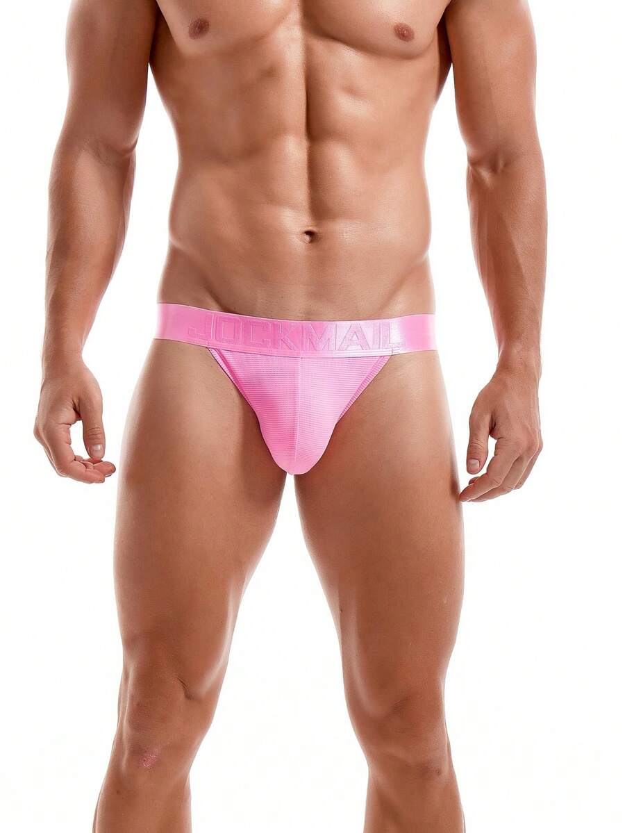 Pink men's low rise thong underwear featuring a minimalist sports brief cut and medium stretch fabric.