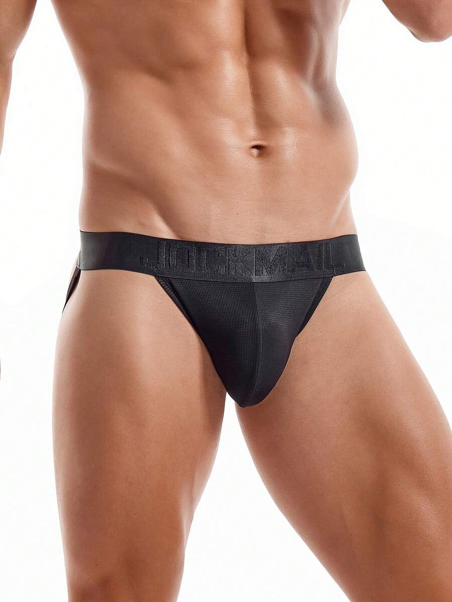 Pink men's low rise thong underwear featuring a minimalist sports brief cut and medium stretch fabric.