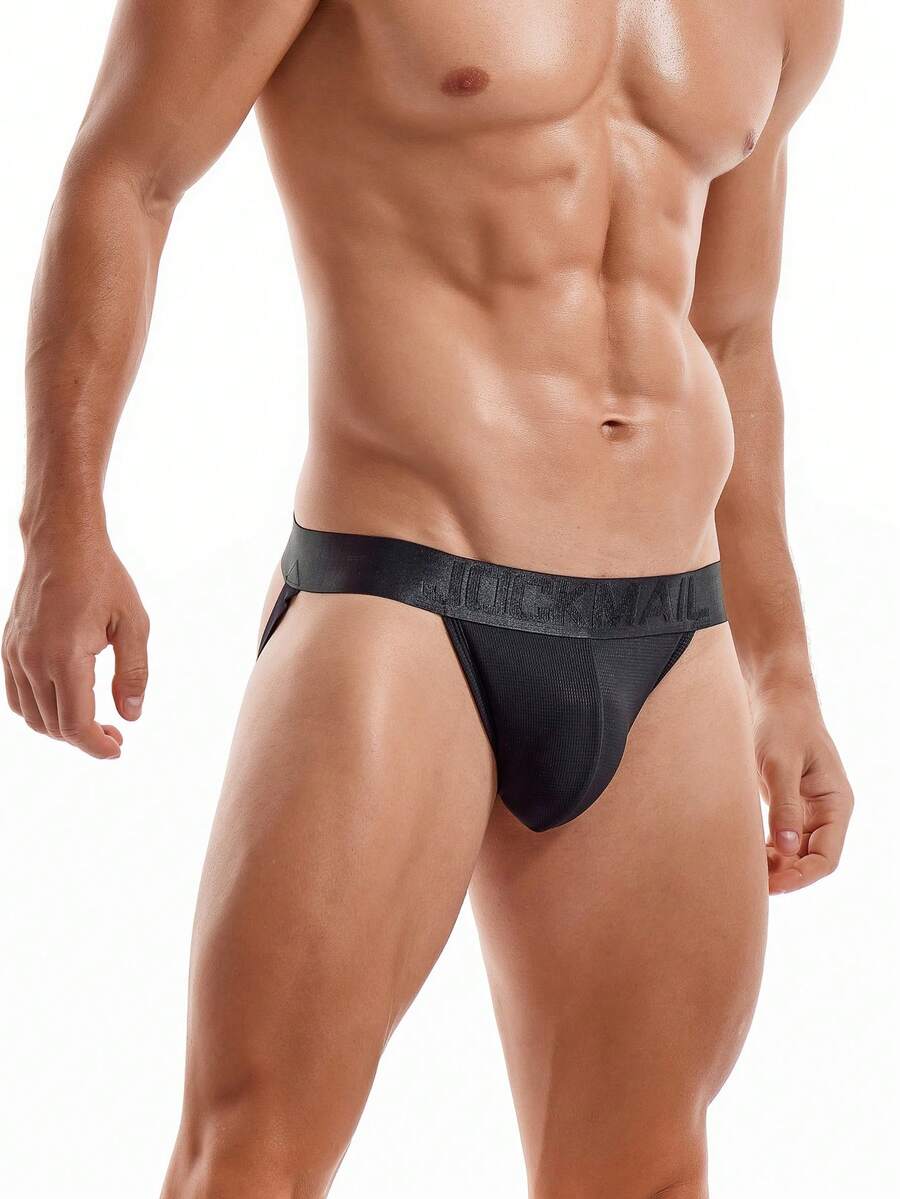 Pink men's low rise thong underwear featuring a minimalist sports brief cut and medium stretch fabric.