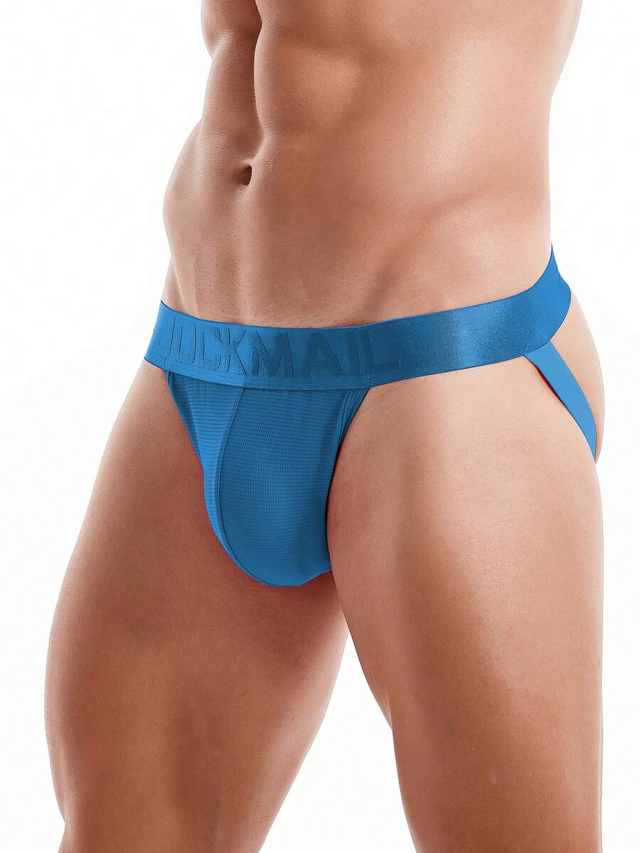 Pink men's low rise thong underwear featuring a minimalist sports brief cut and medium stretch fabric.
