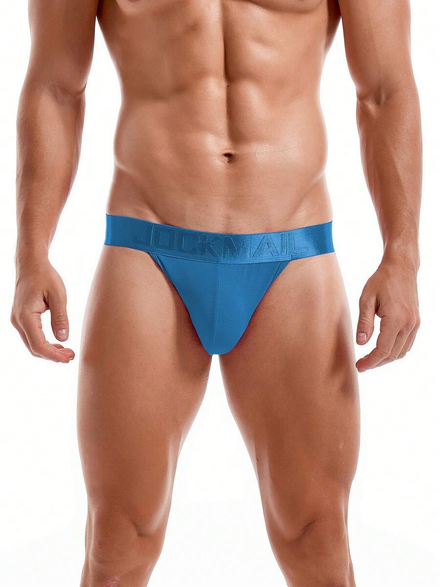 Pink men's low rise thong underwear featuring a minimalist sports brief cut and medium stretch fabric.