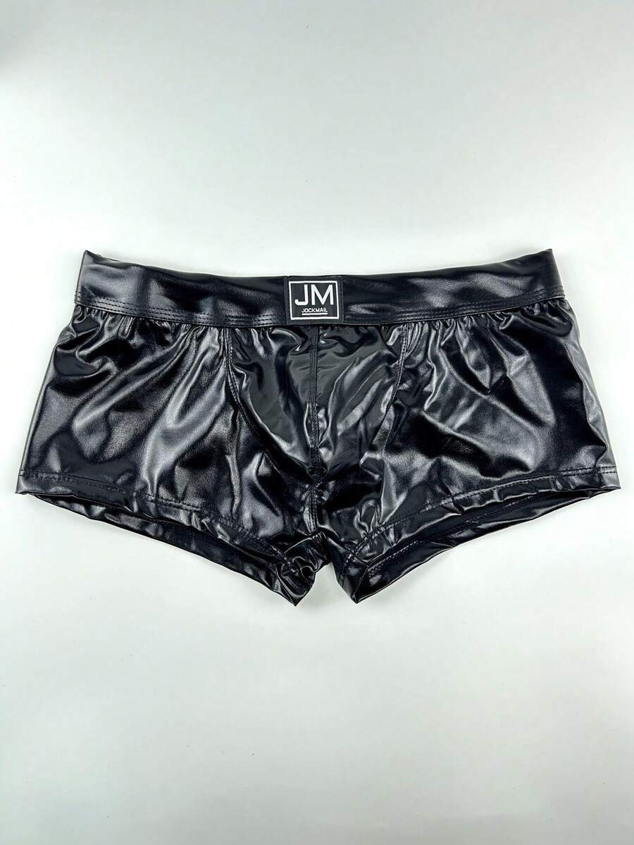 Gold men's glossy stage reflective faux leather trunks featuring mid-rise waistband and stretch fabric.