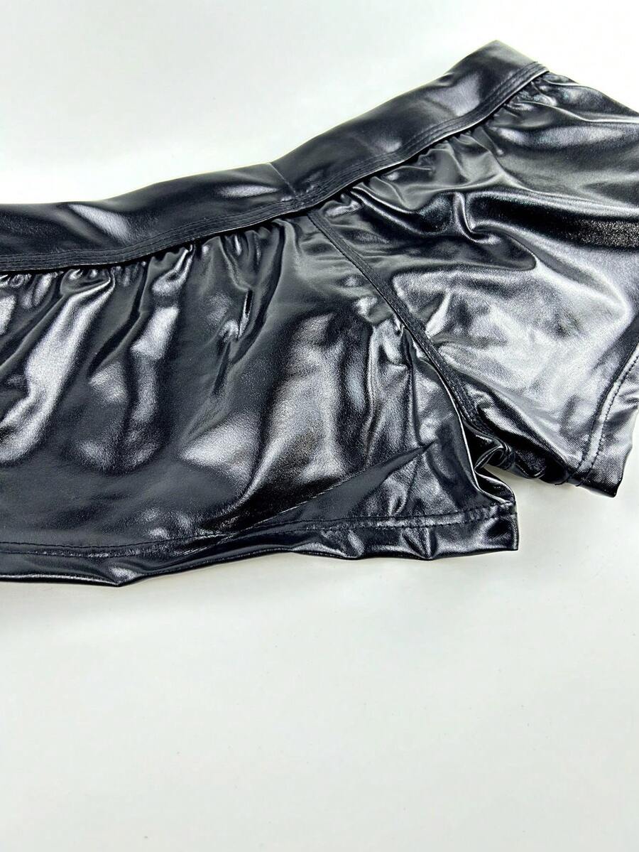 Gold men's glossy stage reflective faux leather trunks featuring mid-rise waistband and stretch fabric.