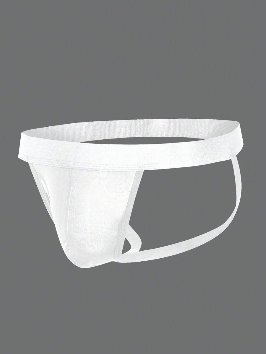 Men's black solid color jockstrap featuring a cut-out back design, tape detailing, and mid-rise waist crafted from medium-stretch knitted fabric.
