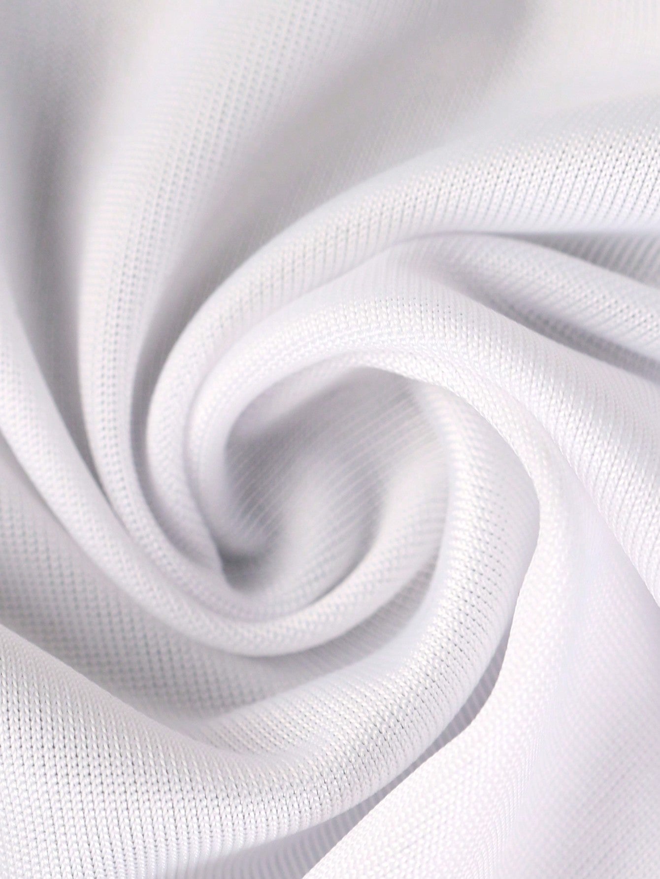Men's white G-string underwear in knitted fabric with tape detail, mid-rise fit, and medium stretch for daily wear.