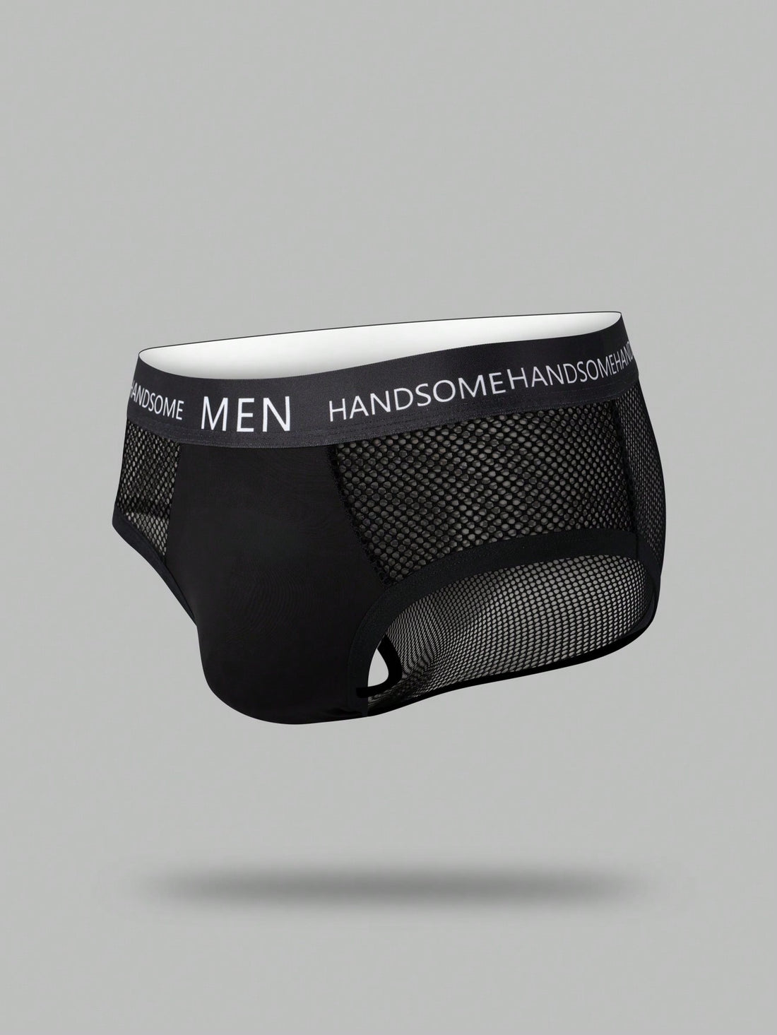 Black men's low rise briefs with cut out detail, letter elastic waistband, and medium-stretch knitted polyamide blend.
