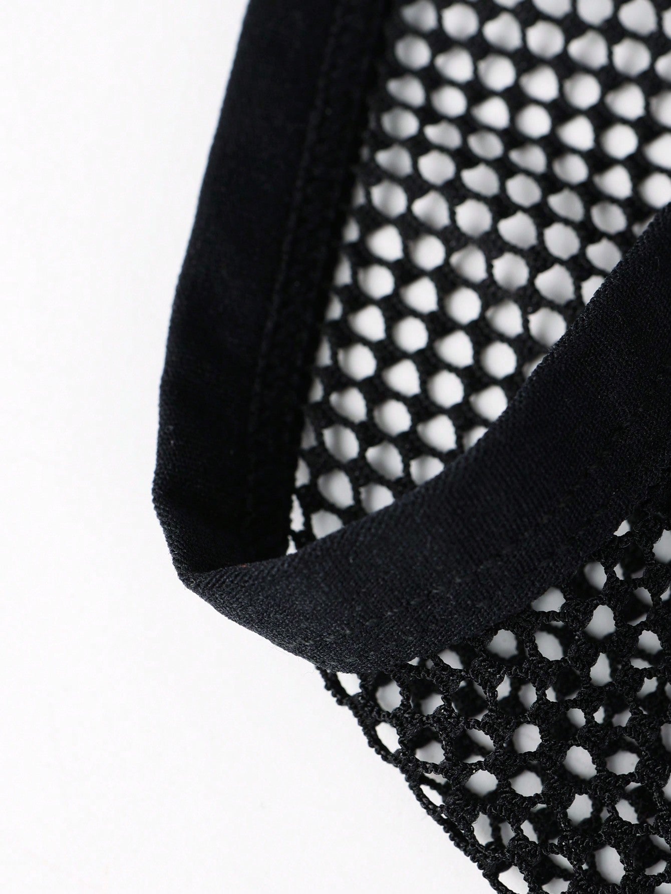 Black men's low rise briefs with cut out detail, letter elastic waistband, and medium-stretch knitted polyamide blend.