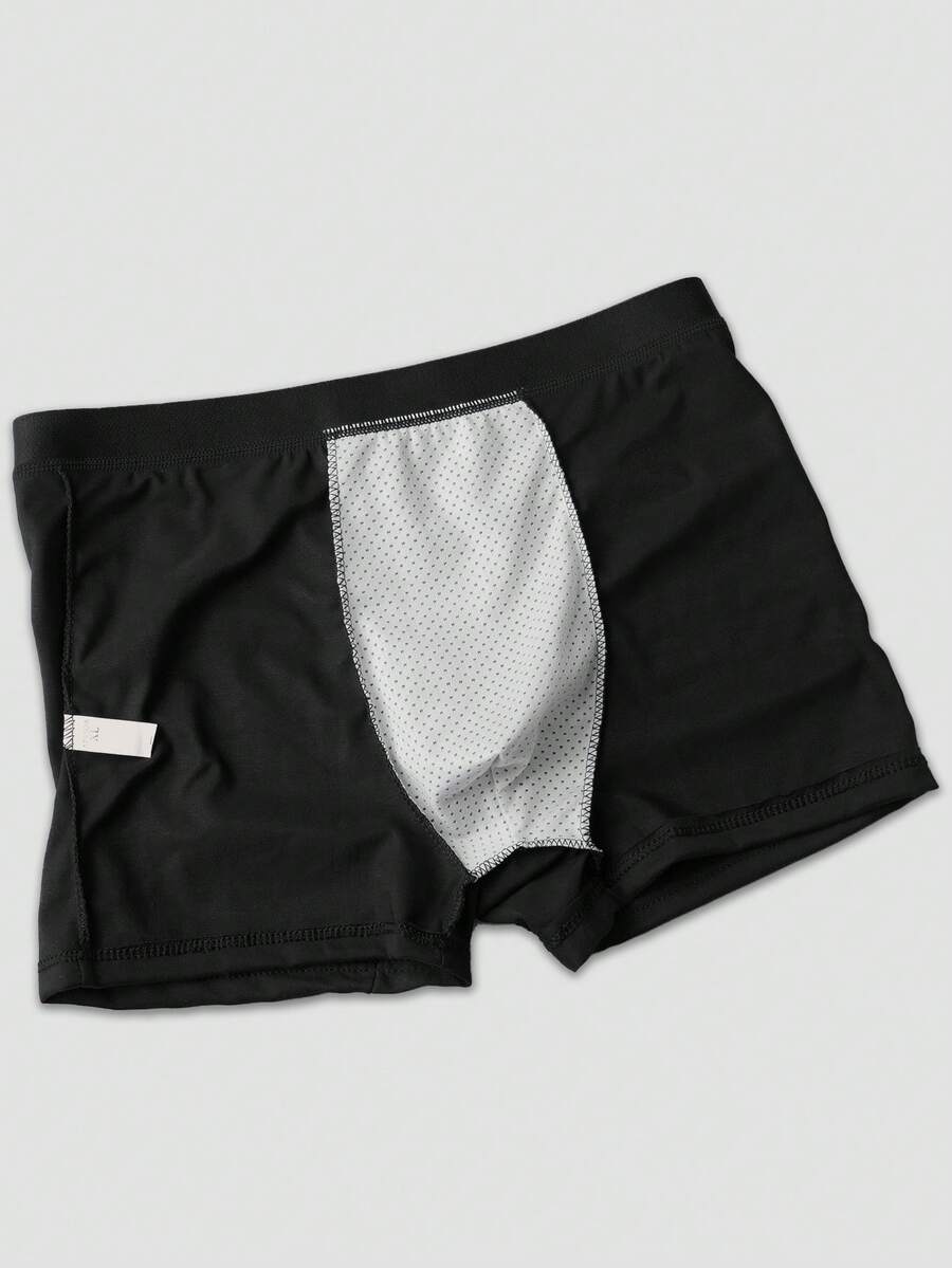 Two pairs of men's black graphic briefs with mid-rise waist, colorblock design, and high stretch fabric.