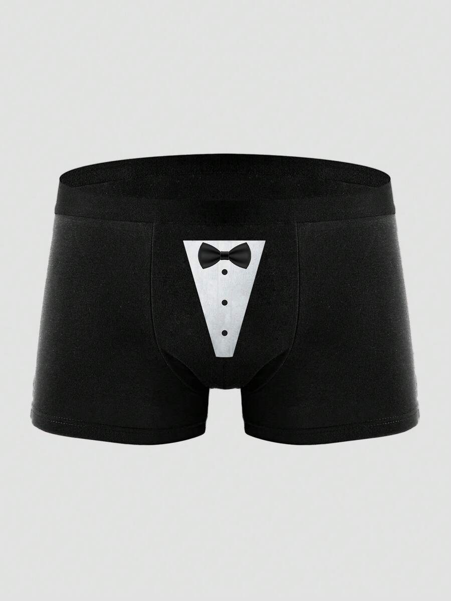 Two pairs of men's black graphic briefs with mid-rise waist, colorblock design, and high stretch fabric.