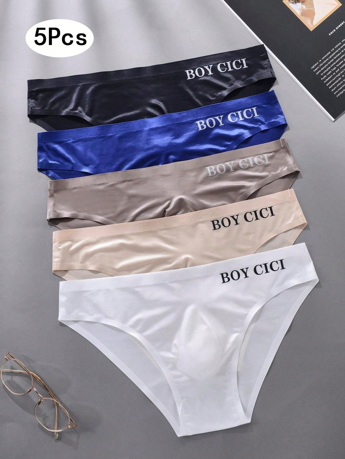 Pack of 5 men's low rise triangle briefs in sporty multicolor plain design made from lightweight stretch fabric.