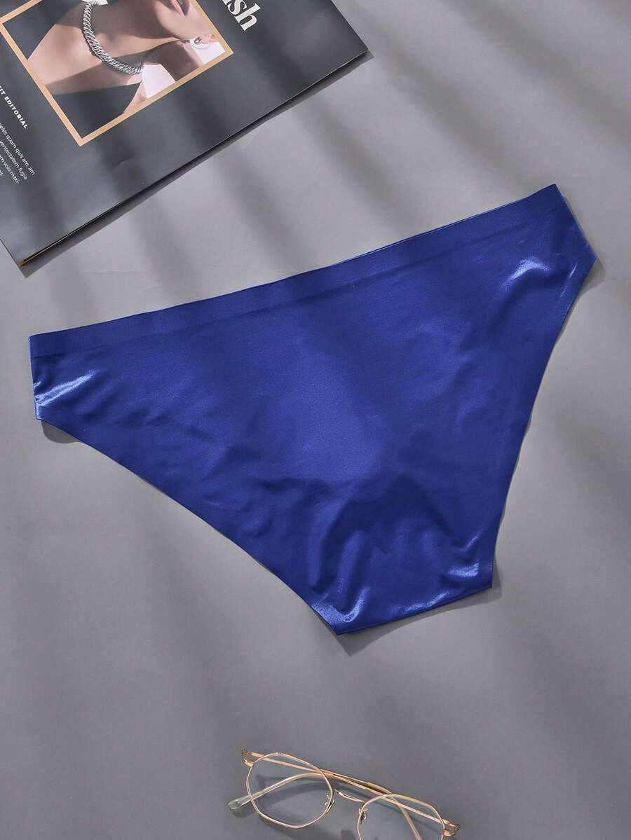 Pack of 5 men's low rise triangle briefs in sporty multicolor plain design made from lightweight stretch fabric.