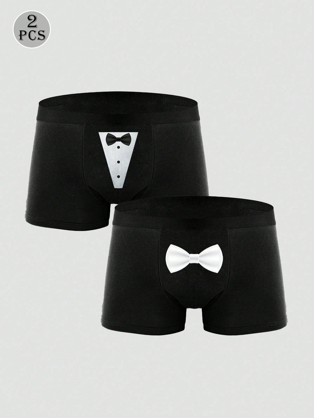 Two pairs of men's black graphic briefs with mid-rise waist, colorblock design, and high stretch fabric.