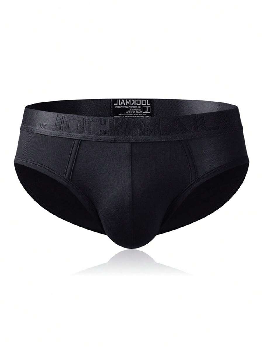 Men's low rise sporty briefs in solid color featuring soft modal fabric with tape details.