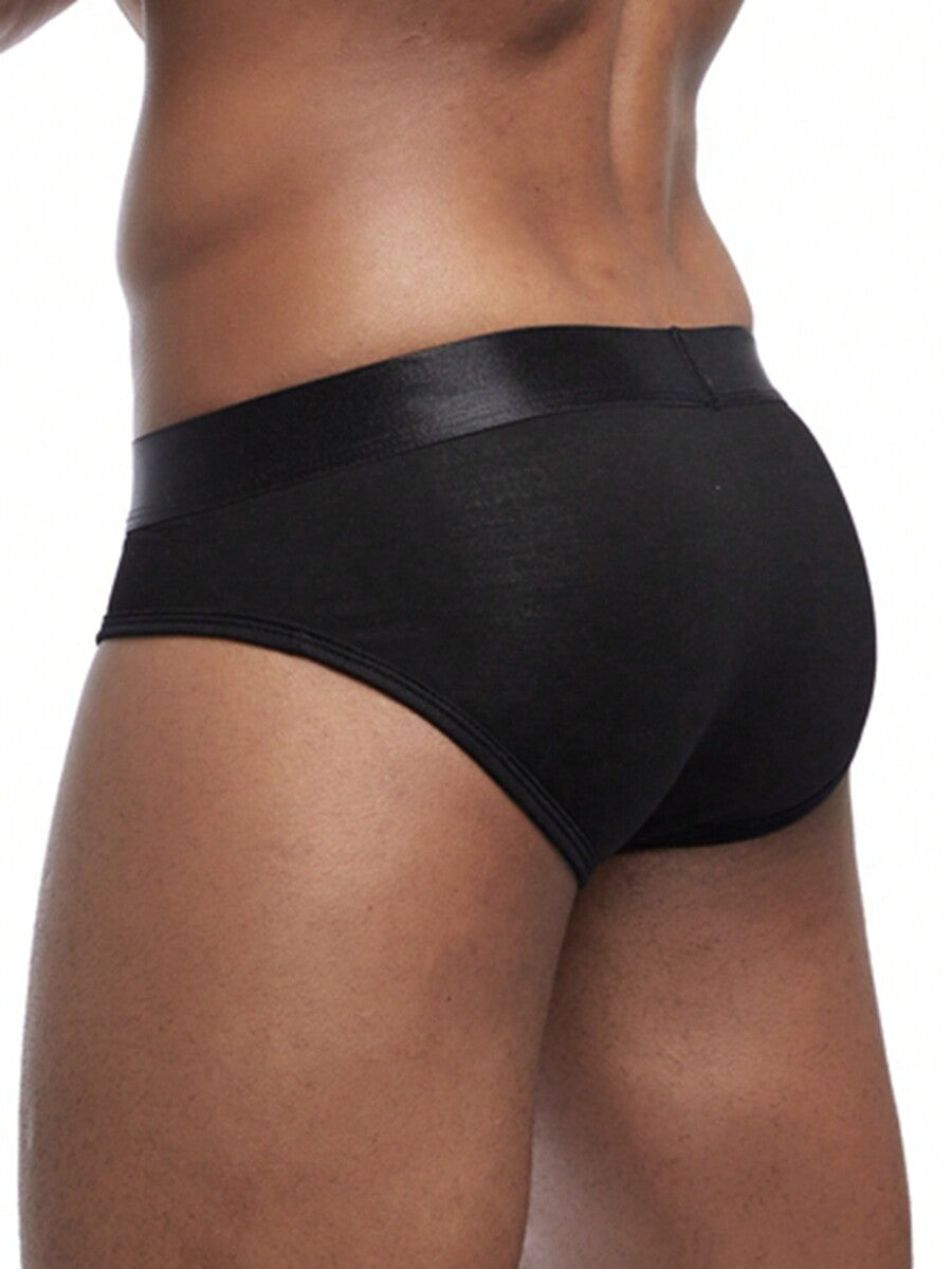 Men's low rise sporty briefs in solid color featuring soft modal fabric with tape details.