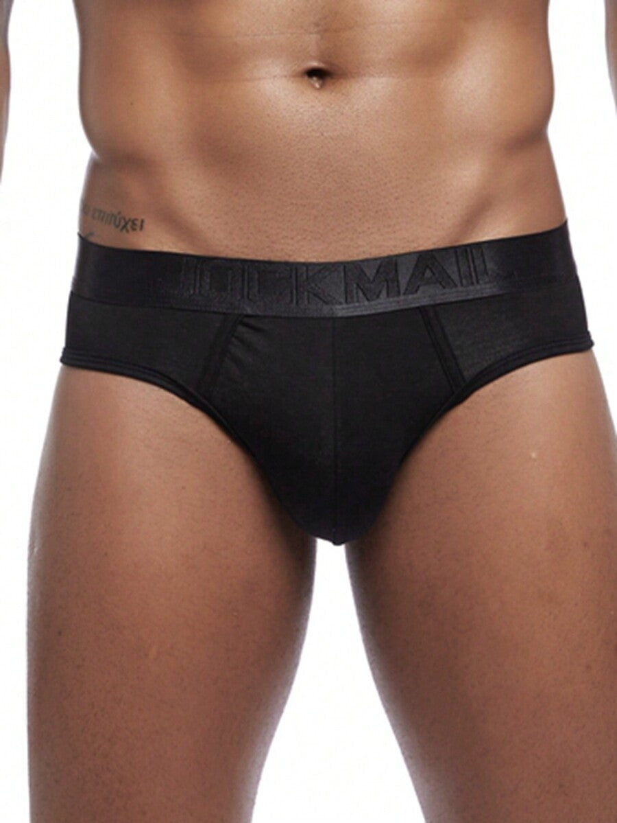 Men's low rise sporty briefs in solid color featuring soft modal fabric with tape details.