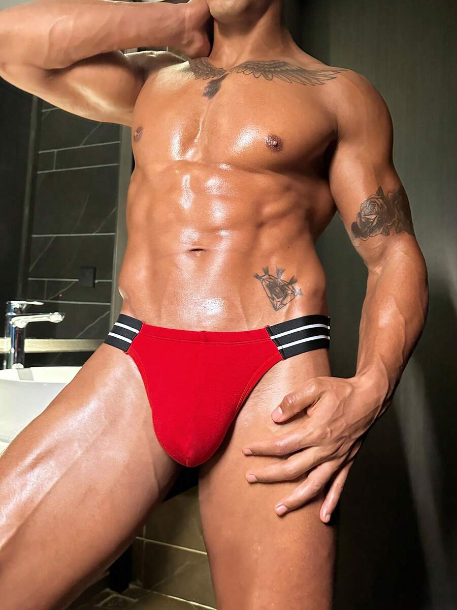 Men's low rise cut out briefs made from knitted stretch viscose fabric featuring colorblock design.