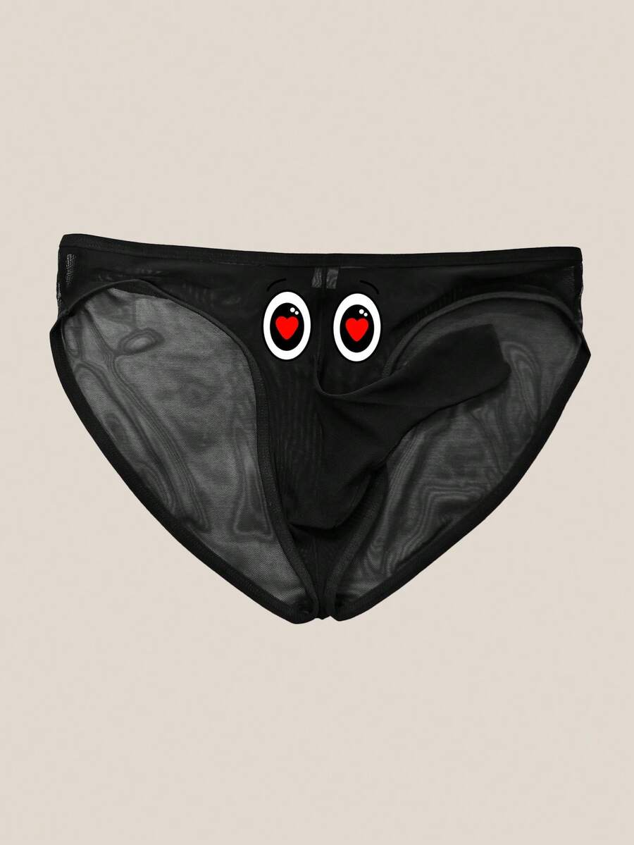 Black semi-sheer mesh thong underwear for men featuring a heart eye print pattern and low-rise fit.