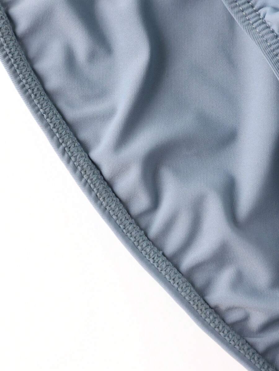 3-pack set of men's low-rise triangle briefs featuring breathable semi-sheer multicolor mesh fabric with medium stretch.