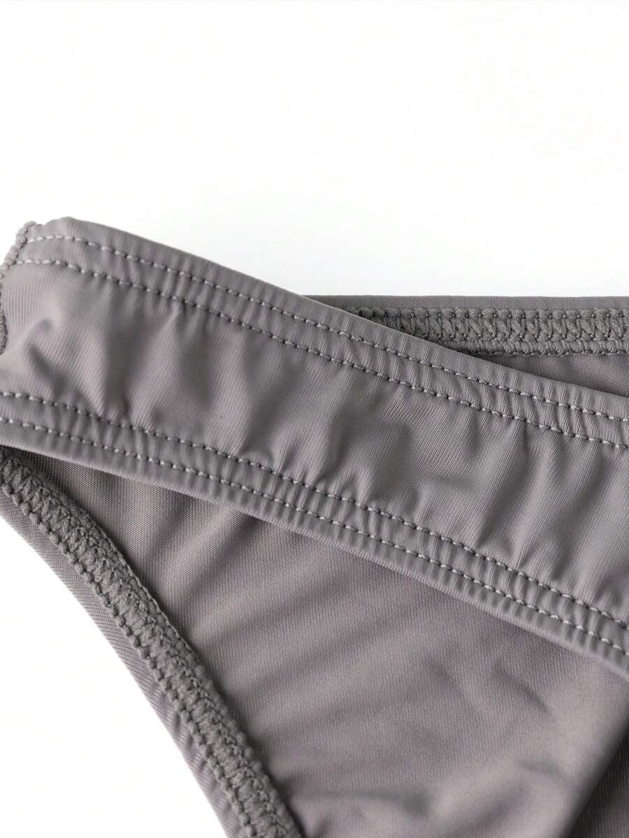 3-pack set of men's low-rise triangle briefs featuring breathable semi-sheer multicolor mesh fabric with medium stretch.
