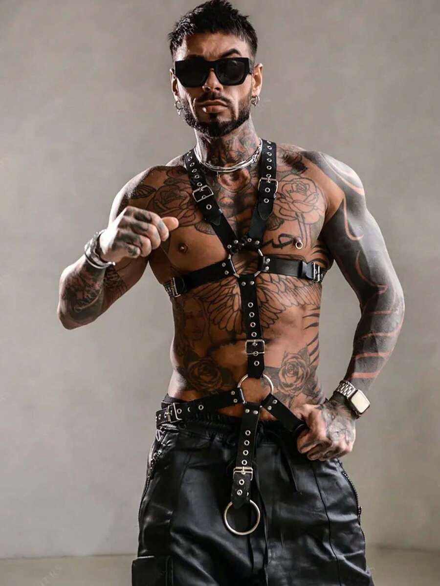 Black PU leather chest harness for men with adjustable straps, rivet details, and a metal O-ring back design.