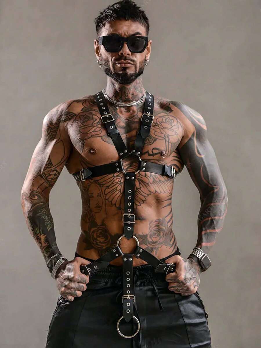Black PU leather chest harness for men with adjustable straps, rivet details, and a metal O-ring back design.
