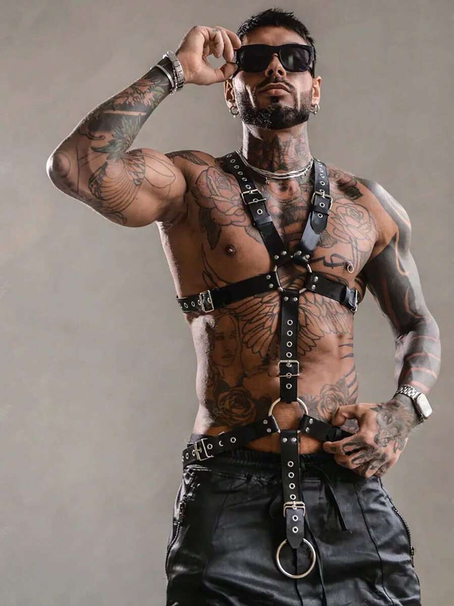 Black PU leather chest harness for men with adjustable straps, rivet details, and a metal O-ring back design.