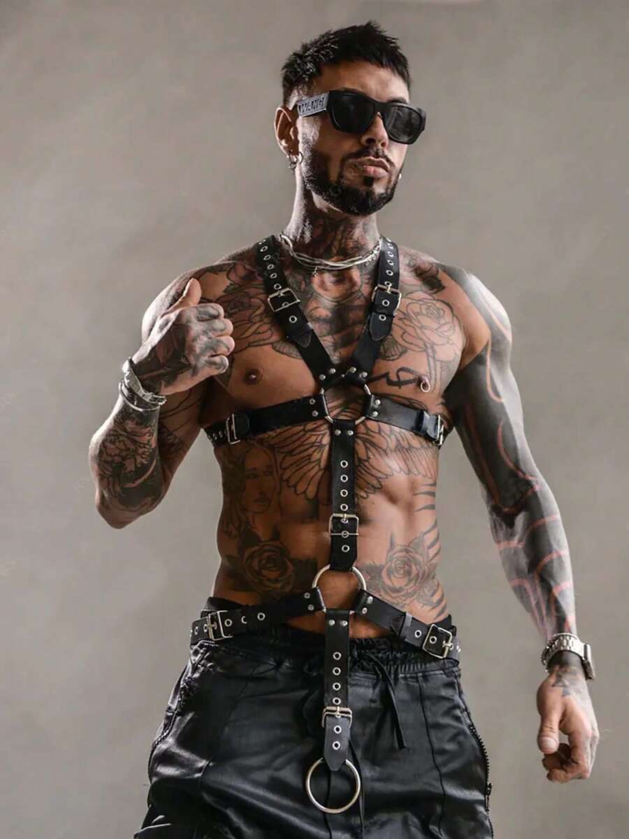 Black PU leather chest harness for men with adjustable straps, rivet details, and a metal O-ring back design.