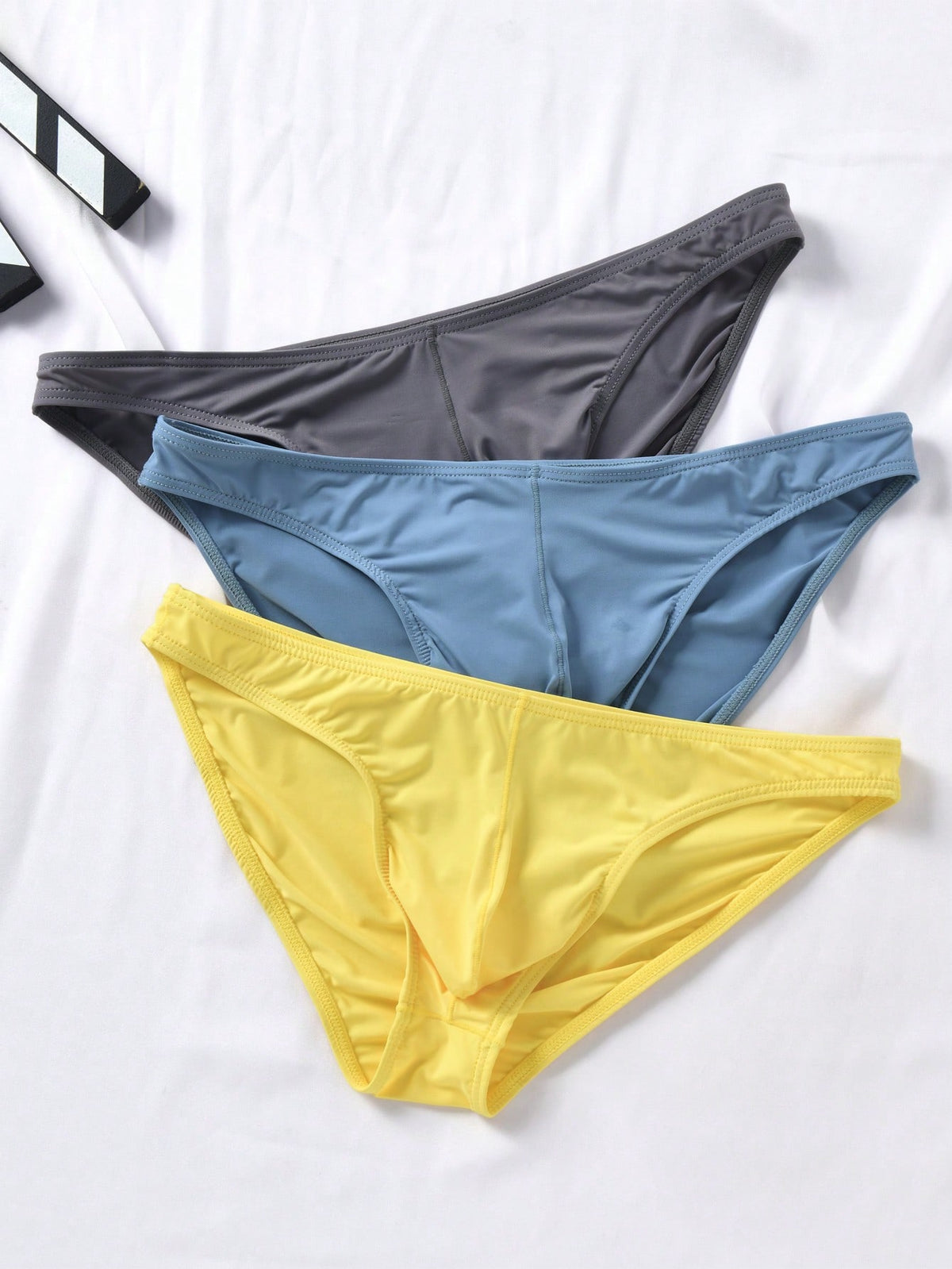 3-pack set of men's low-rise triangle briefs featuring breathable semi-sheer multicolor mesh fabric with medium stretch.