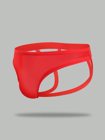 Red men's low-rise jockstrap underwear featuring criss-cross cut-out details in medium stretch knitted fabric.