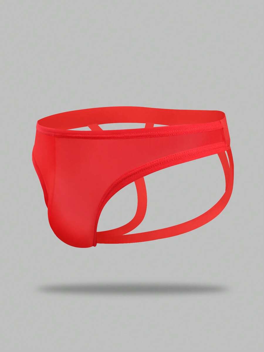 Red men's low-rise jockstrap underwear featuring criss-cross cut-out details in medium stretch knitted fabric.