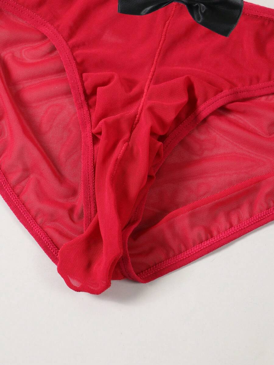 Men's sheer mesh triangle briefs in solid color featuring a mid-rise waist and breathable knitted stretch fabric.