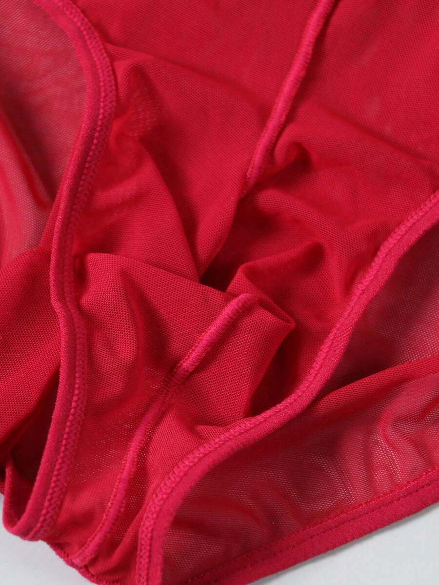 Men's sheer mesh triangle briefs in solid color featuring a mid-rise waist and breathable knitted stretch fabric.