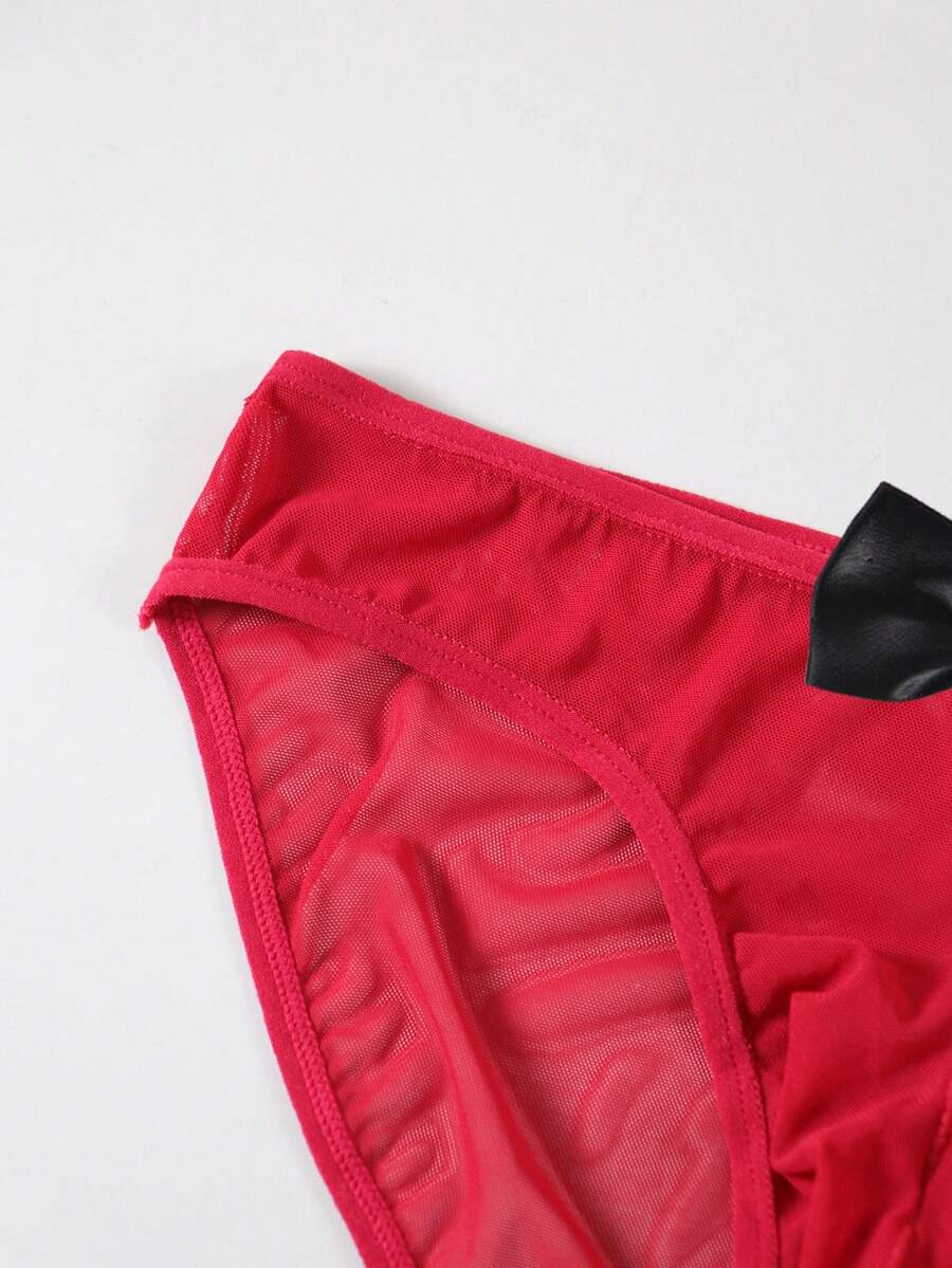Men's sheer mesh triangle briefs in solid color featuring a mid-rise waist and breathable knitted stretch fabric.