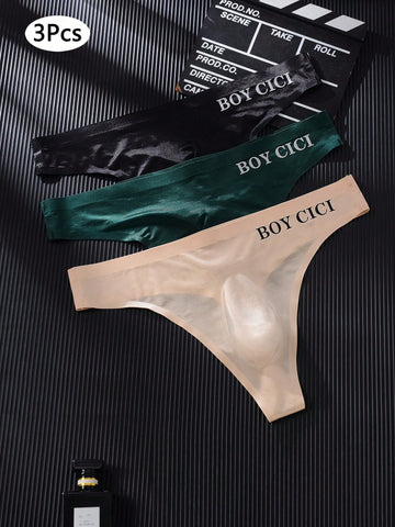 3-pack of men's multicolor low rise seamless thong underwear with letter print details in semi-sheer knitted fabric.