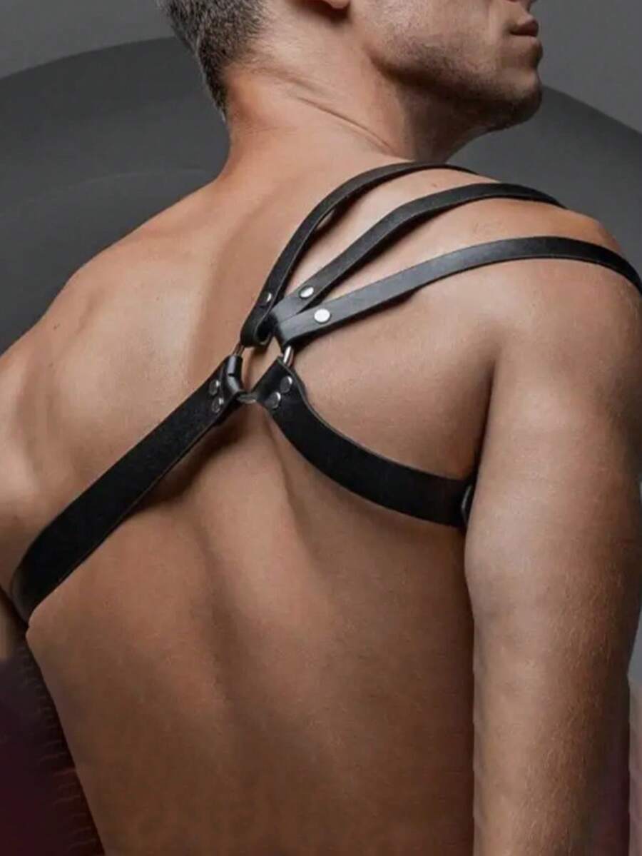 Men's black PU leather chest belt body harness with ring detail in cyberpunk style.