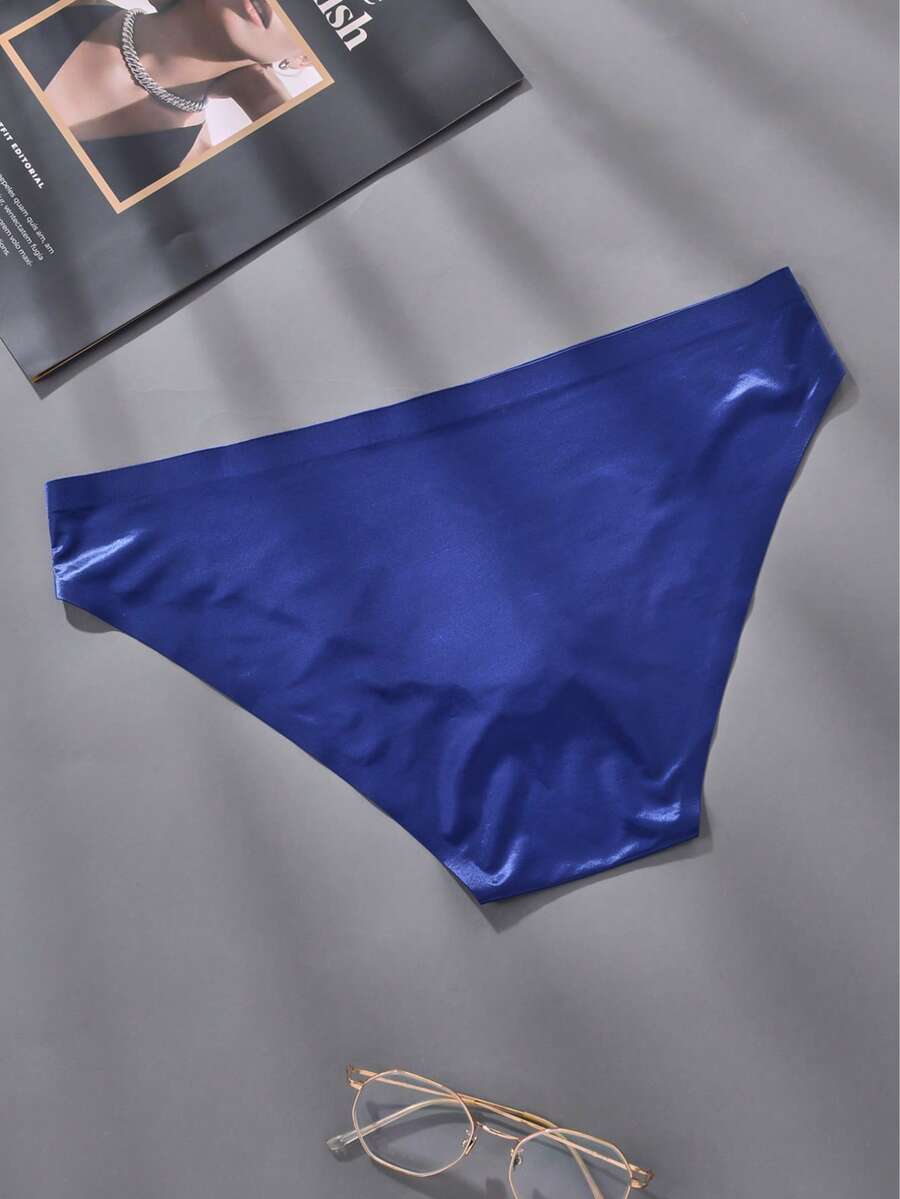 Pack of 5 men's low rise triangle briefs in sporty multicolor plain design made from lightweight stretch fabric.
