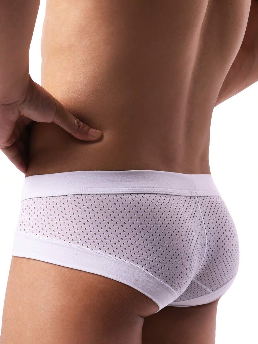 White plain men's U-convex thong underwear featuring low rise cut-out design in breathable stretch fabric.