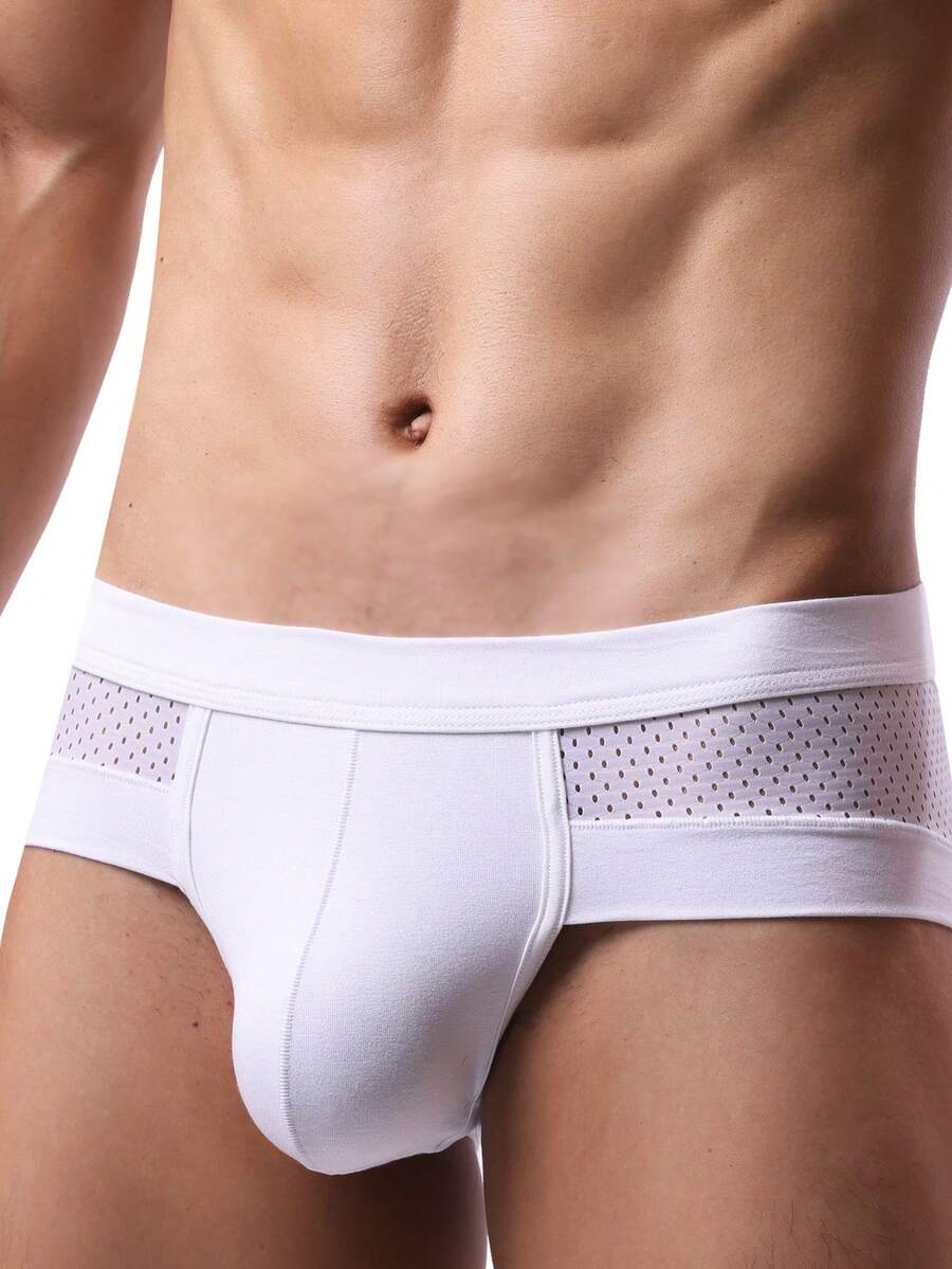 White plain men's U-convex thong underwear featuring low rise cut-out design in breathable stretch fabric.