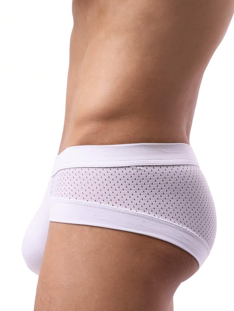 White plain men's U-convex thong underwear featuring low rise cut-out design in breathable stretch fabric.