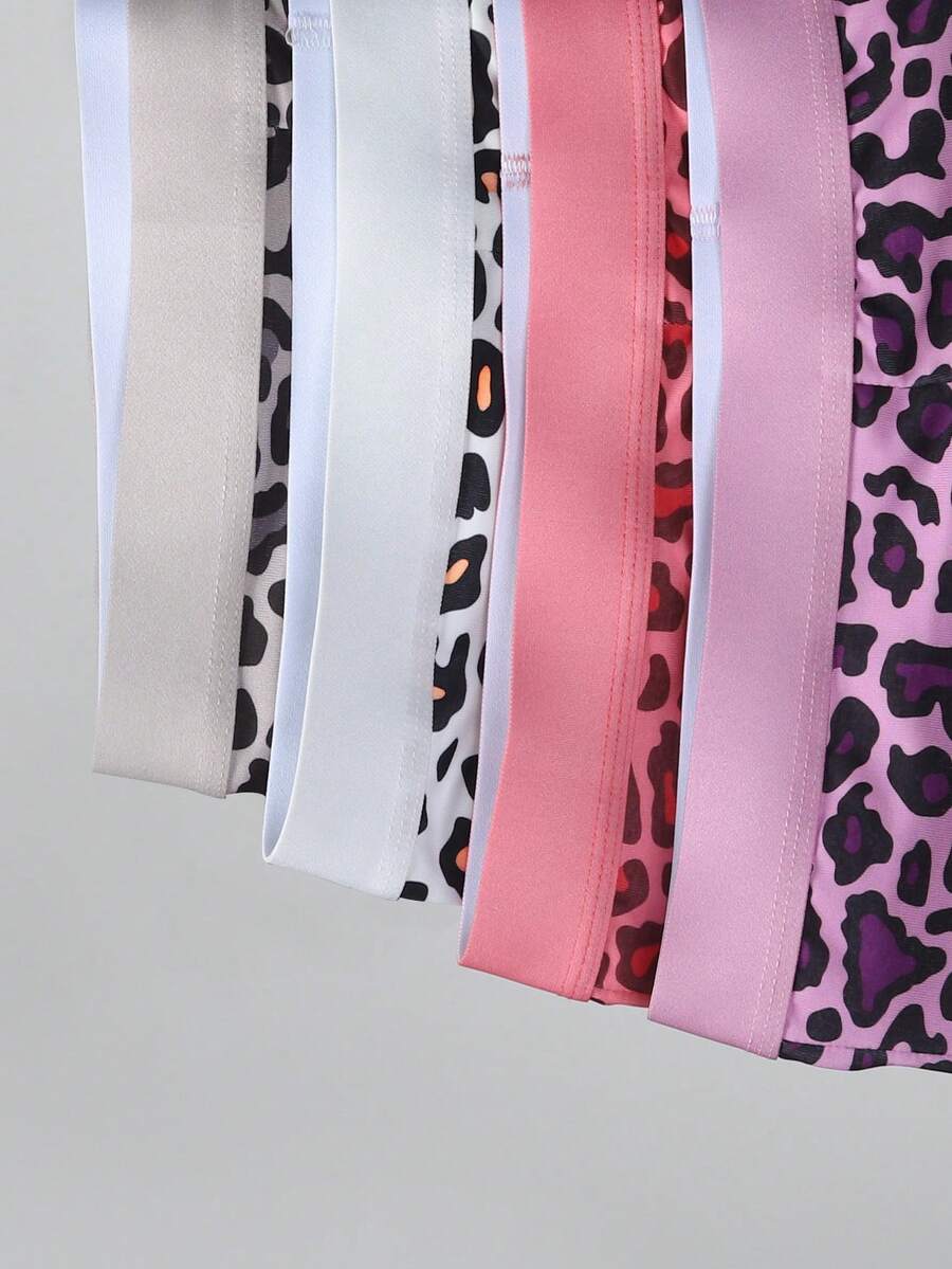 4-pack of men's multicolor leopard print boxer briefs with mid-rise elastic waistband