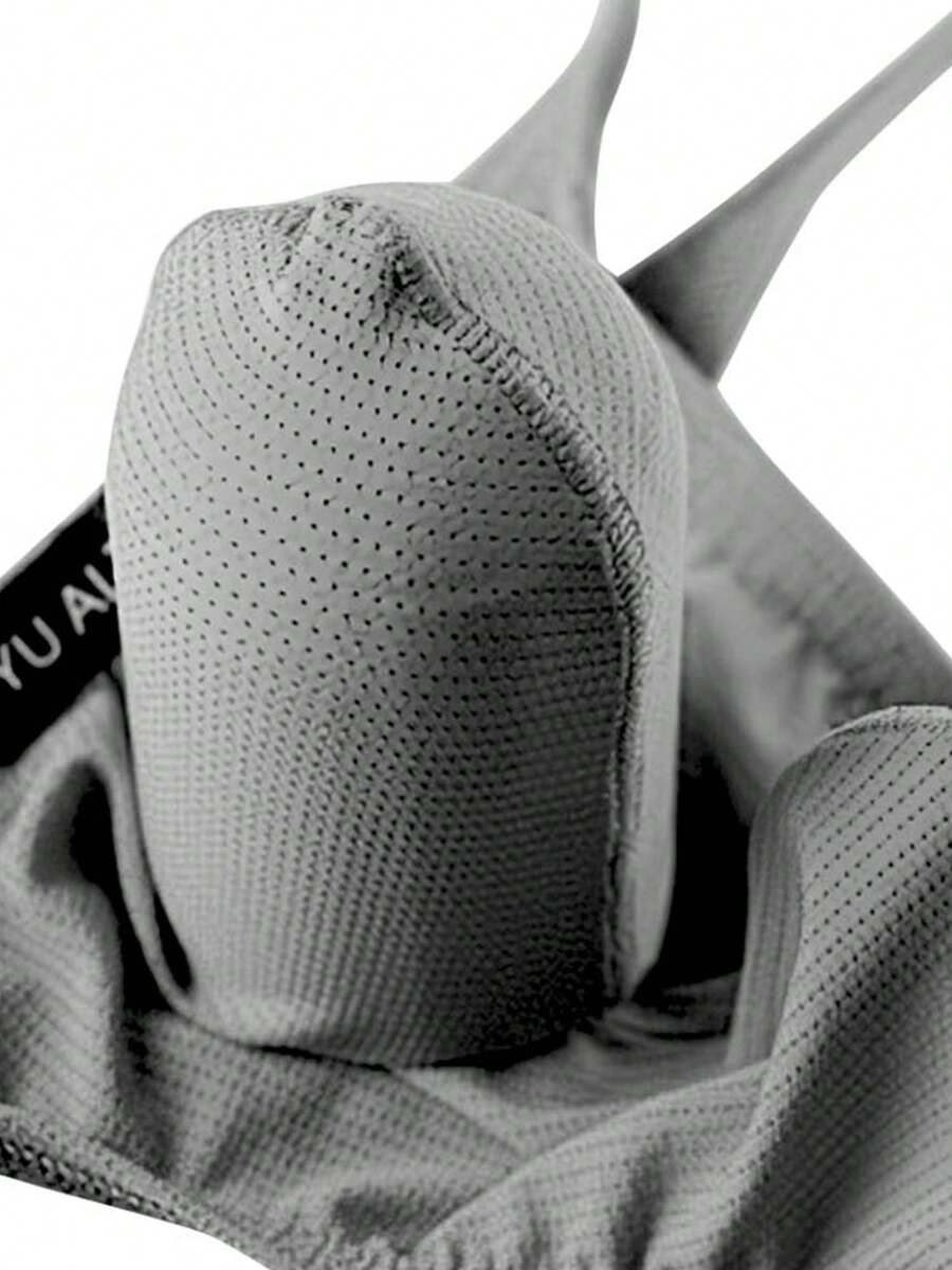 3-pack of men's low-rise g-string thong underwear featuring a bulge pouch design, breathable mesh fabric, and high elastic waistband.
