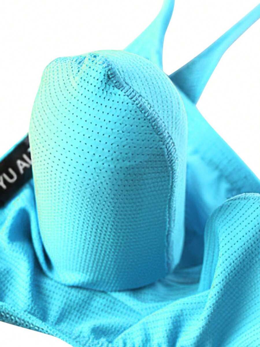 3-pack of men's low-rise g-string thong underwear featuring a bulge pouch design, breathable mesh fabric, and high elastic waistband.