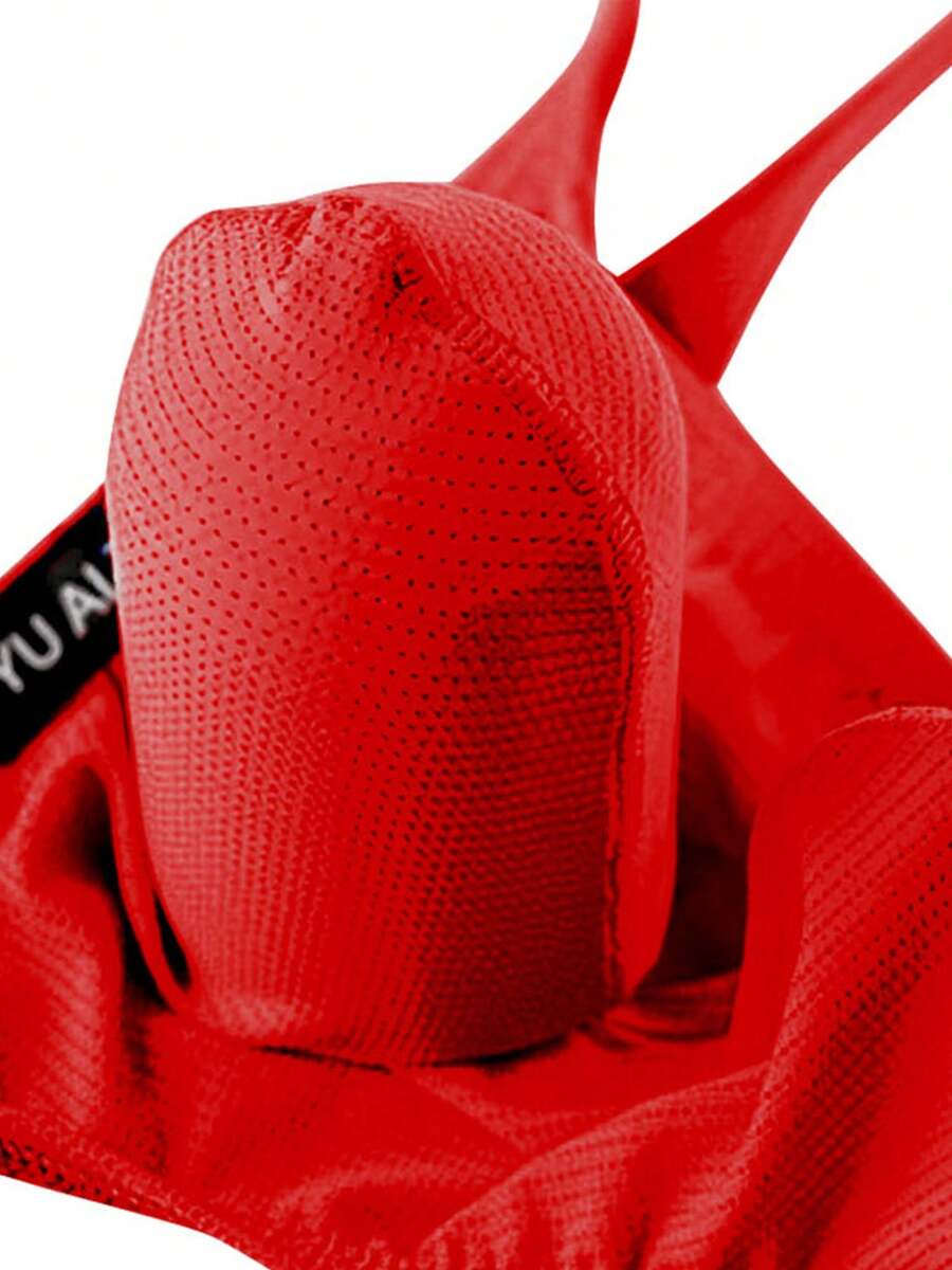 3-pack of men's low-rise g-string thong underwear featuring a bulge pouch design, breathable mesh fabric, and high elastic waistband.
