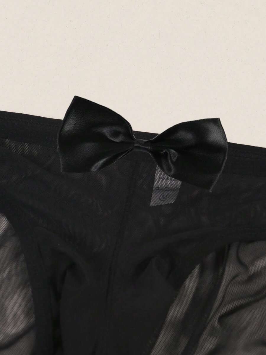 Men's sheer mesh triangle briefs in solid color featuring a mid-rise waist and breathable knitted stretch fabric.
