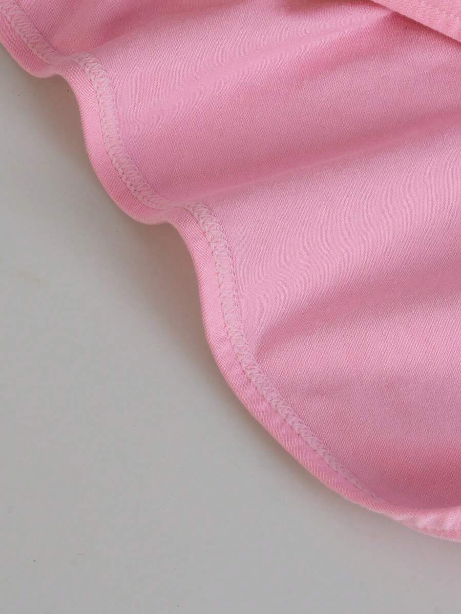 Pink men's low-rise cotton triangle briefs featuring sporty cut and decorative fake pockets.