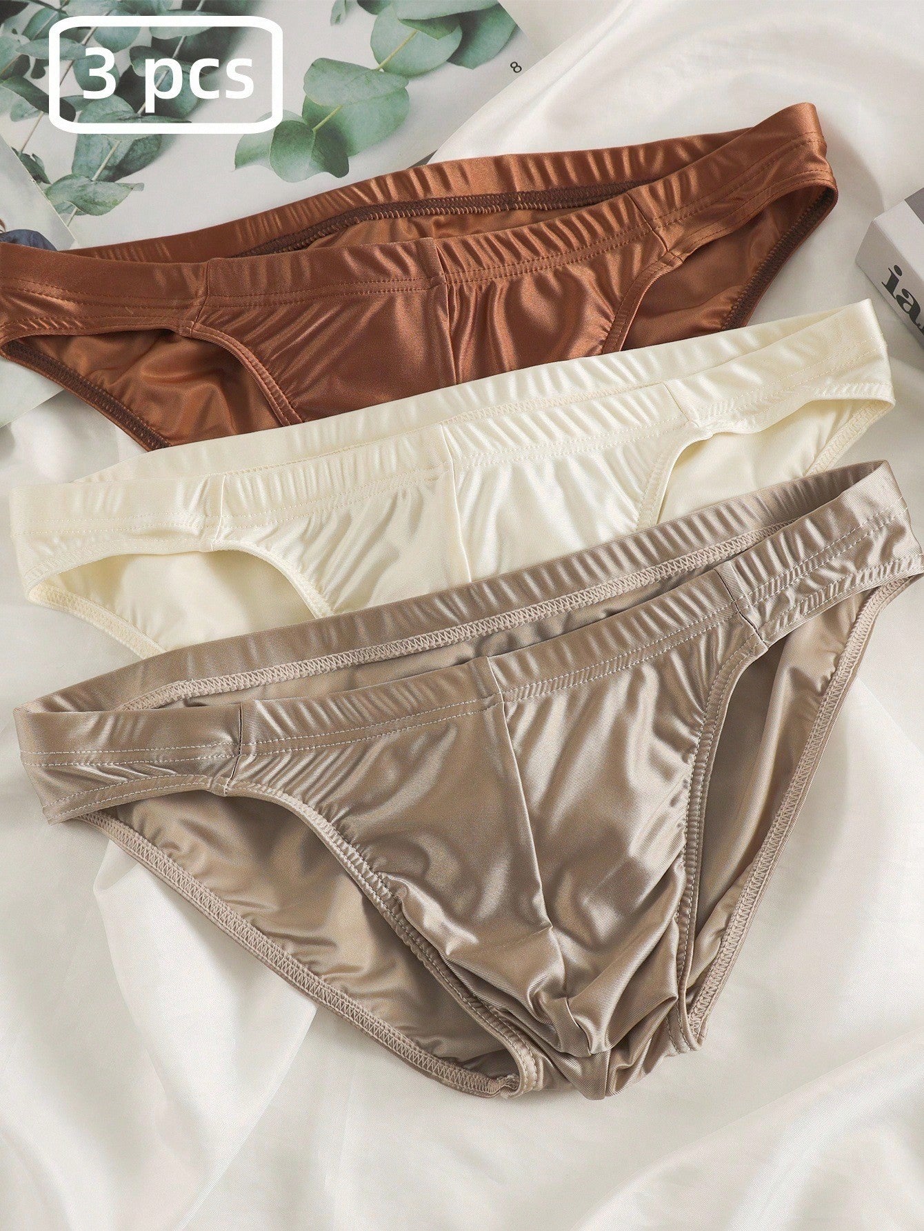 Men's low-rise plain briefs 3-piece set in multicolor knitted fabric with hollow out detail and medium stretch.