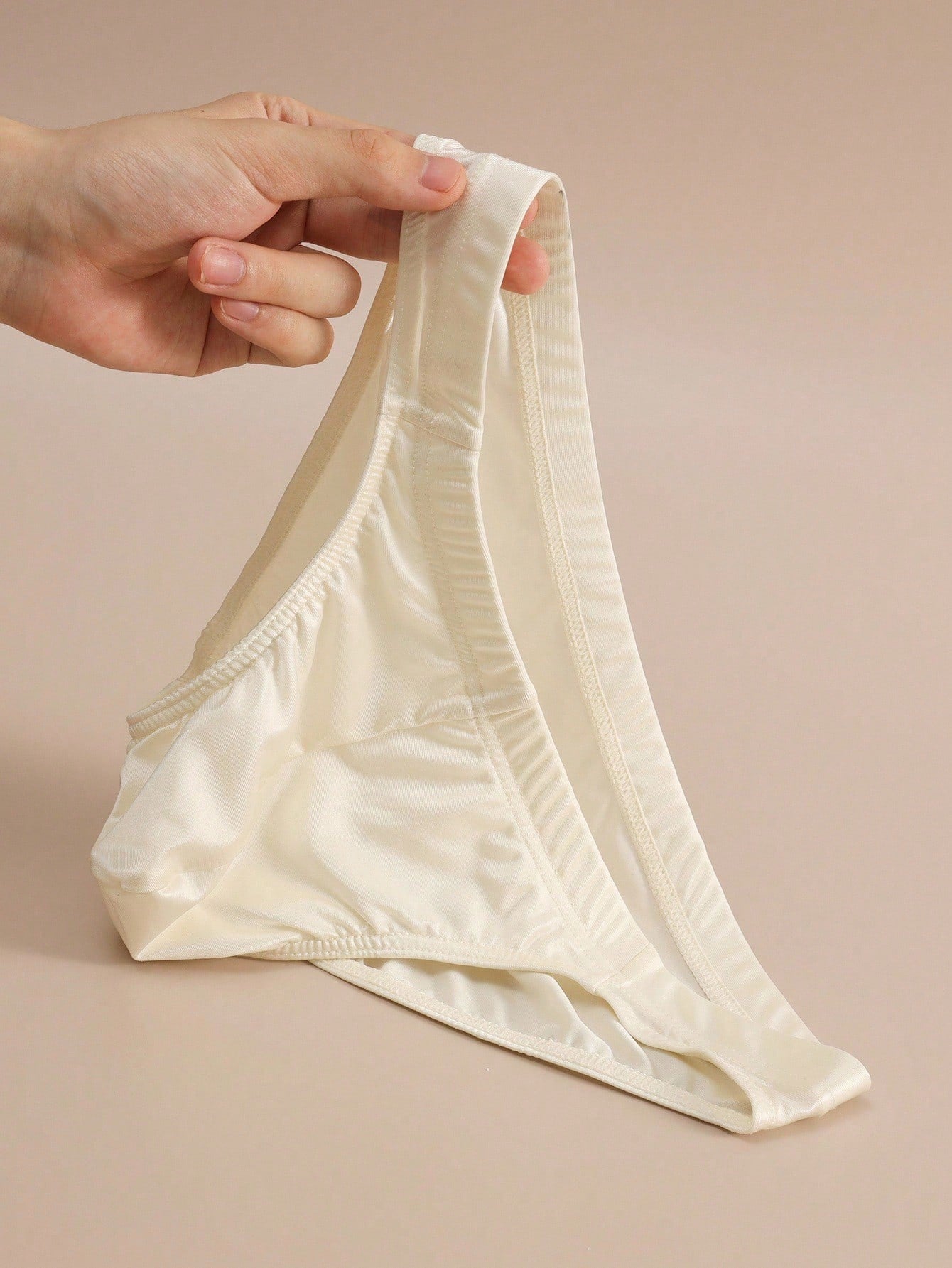 Men's low-rise plain briefs 3-piece set in multicolor knitted fabric with hollow out detail and medium stretch.